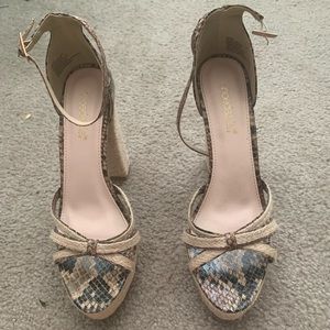 Snake print open toe heels